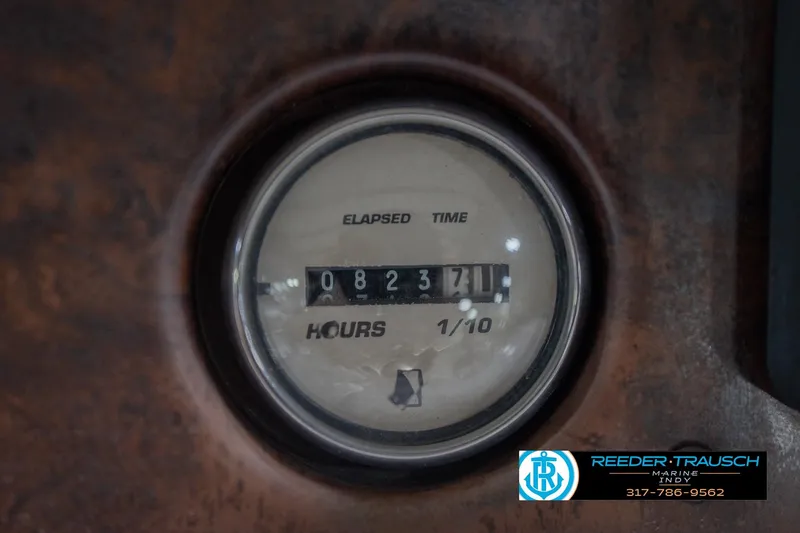 Slide: The Image of Hour meter on 2002 Hurricane SunDeck Sport 232 OB boat, showing 823.7 hours. - 37