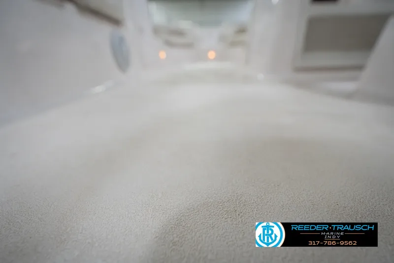 Slide: The Image of 2002 Hurricane SunDeck Sport 232 OB interior view, showcasing clean deck surface. - 46