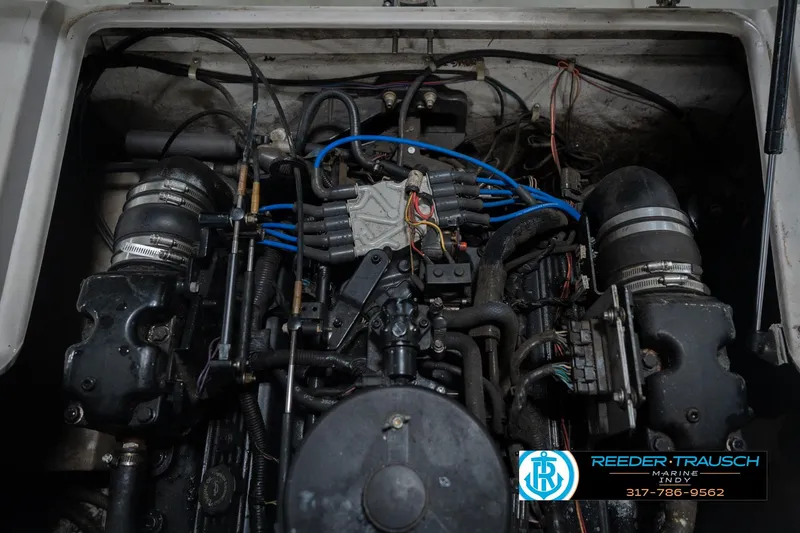 Slide: The Image of Engine compartment of a 2002 Hurricane SunDeck Sport 232 OB boat. - 48