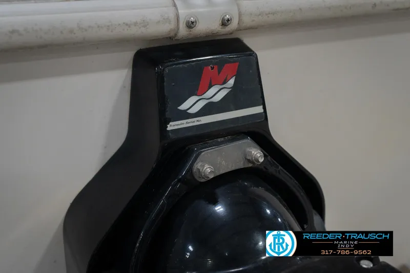 Slide: The Image of Close-up of a 2002 Hurricane SunDeck Sport 232 OB boat transom with logo and serial number. - 49