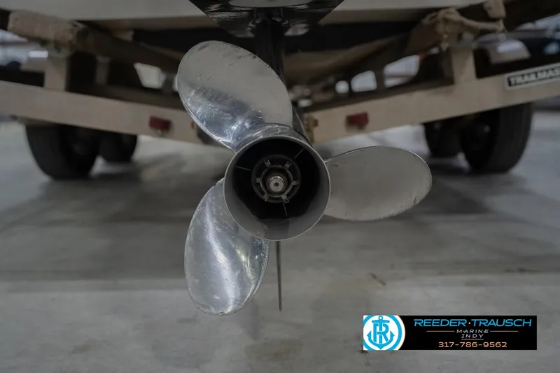 Slide: The Image of Propeller of 2002 Hurricane SunDeck Sport 232 OB boat on trailer in garage. - 51