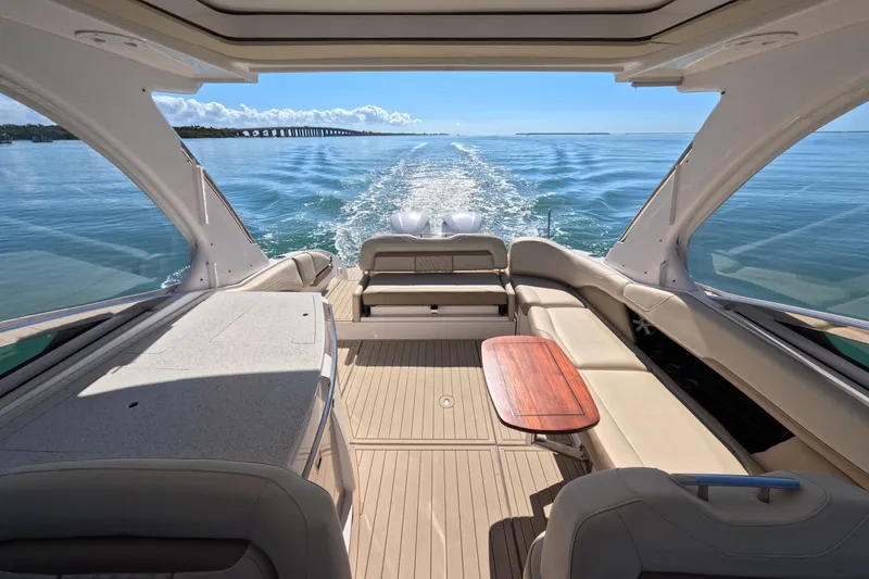 Slide: The Image of Luxurious 2018 Regal 33 OBX boat interior with scenic ocean view. - 15
