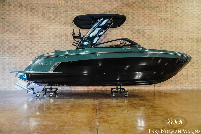 The Image of 2026 Cobalt R6 Surf boat displayed indoors at Lake Norman Marina. - 0
