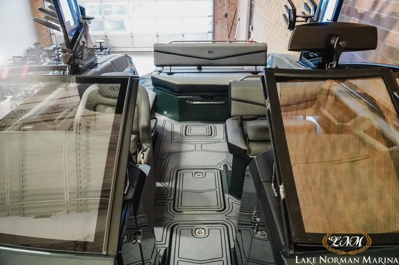 Slide: The Image of 2026 Cobalt R6 Surf boat interior with modern seating and sleek design at Lake Norman Marina. - 16