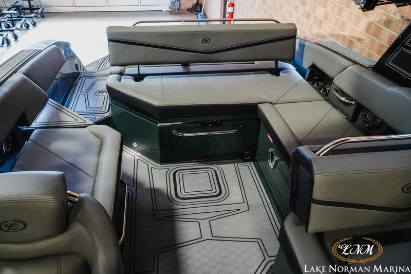 Slide: The Image of Luxurious interior of 2026 Cobalt R6 Surf boat with sleek seating and modern design. - 18