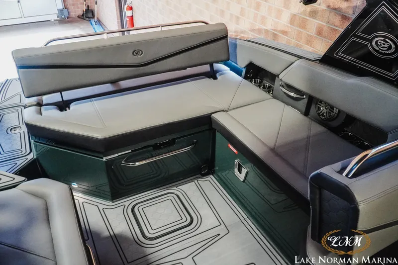 Slide: The Image of 2026 Cobalt R6 Surf boat interior with sleek seating and modern design at Lake Norman Marina. - 19