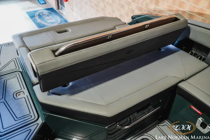 Slide: The Image of 2026 Cobalt R6 Surf boat interior with sleek, modern seating design at Lake Norman Marina. - 21