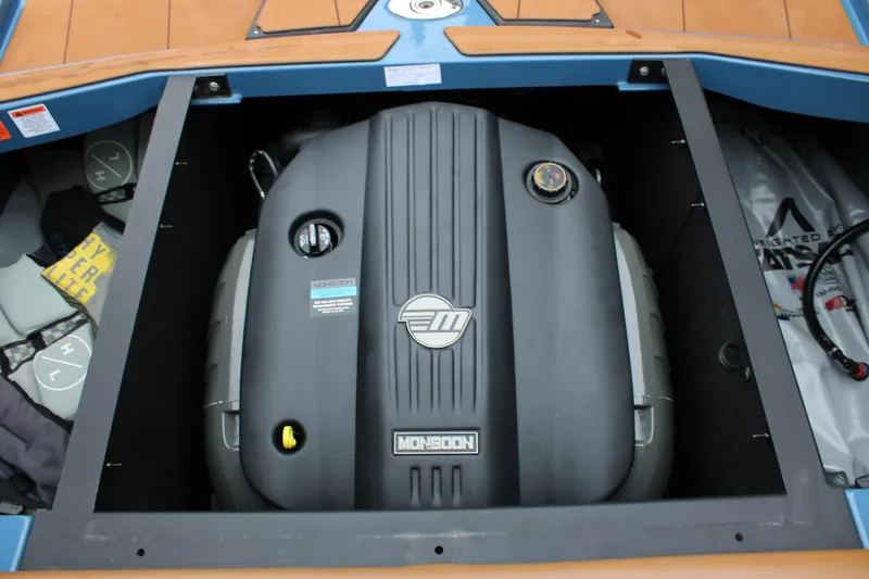 Slide: The Image of 2023 Axis A225 boat engine compartment with Monsoon engine visible. - 14