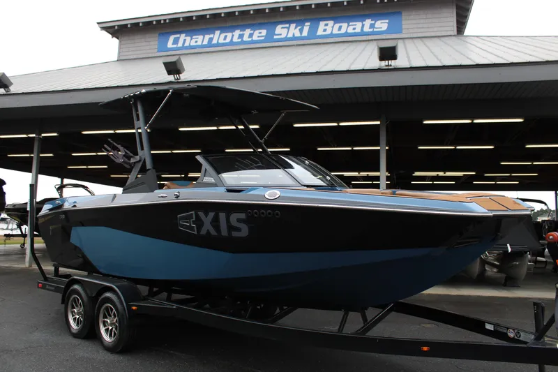 Slide: The Image of 2023 Axis A225 boat on trailer at Charlotte Ski Boats dealership. - 20