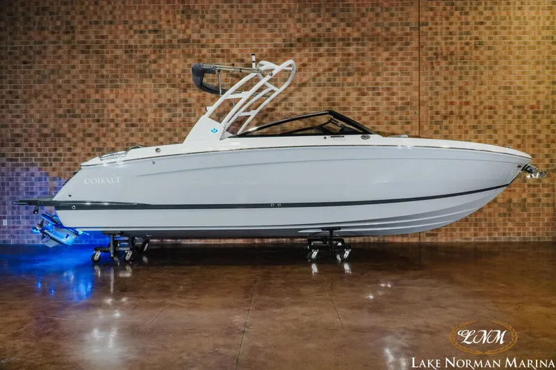 The Image of 2026 Cobalt R8 boat displayed indoors at Lake Norman Marina. - 1