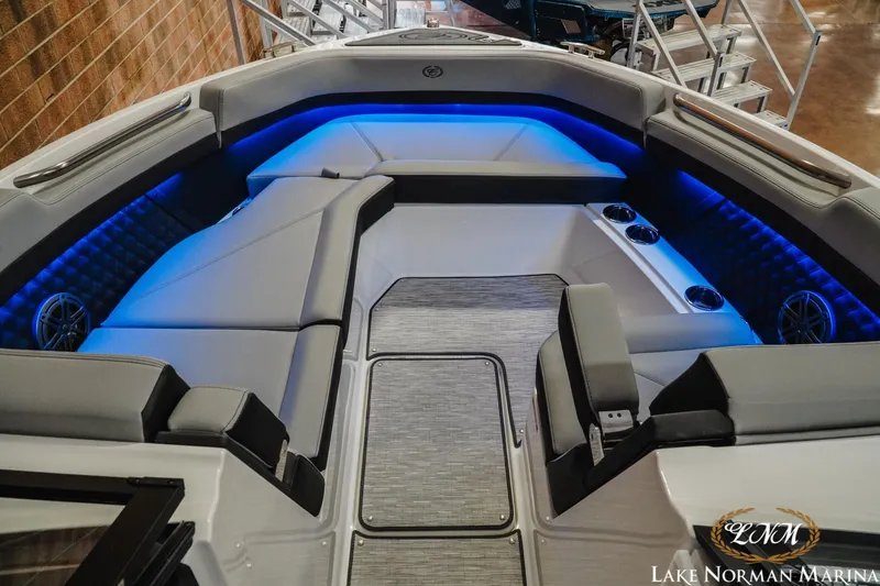 Slide: The Image of Luxurious interior of 2026 Cobalt R8 boat with blue LED lighting and plush seating. - 22