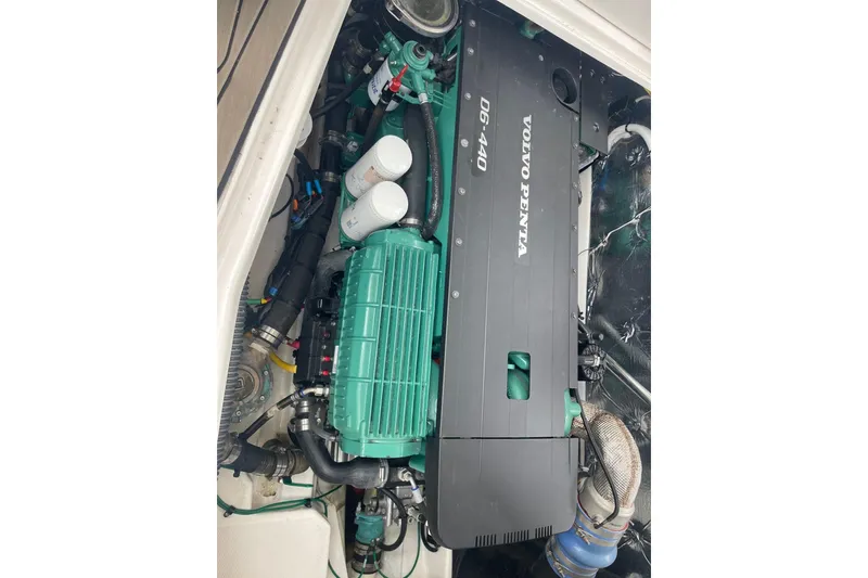 Slide: The Image of Volvo Penta engine in 2022 Cutwater C-30 Sedan boat, showcasing mechanical components. - 13