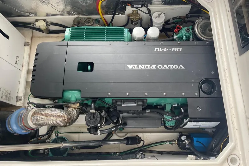 Slide: The Image of Engine compartment of a 2022 Cutwater C-30 Sedan featuring a Volvo Penta D6-440 engine. - 14