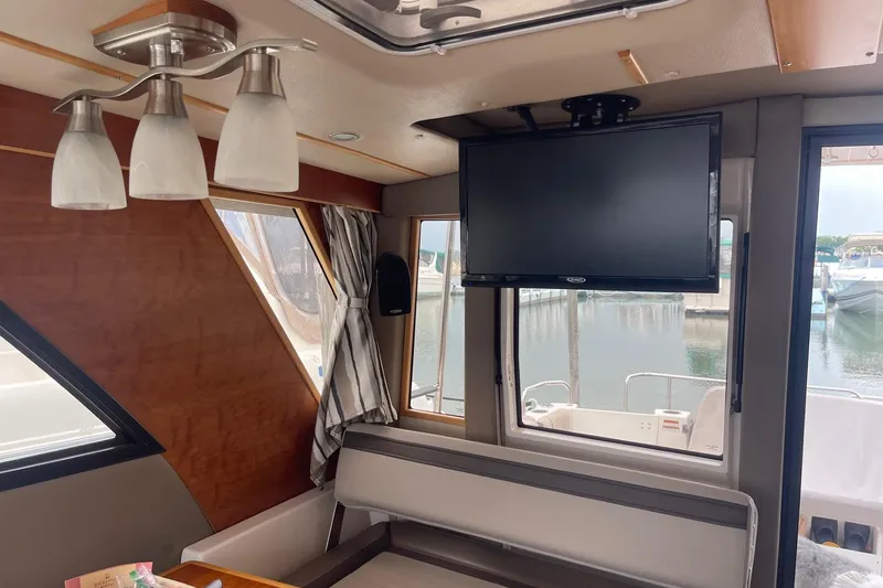 Slide: The Image of Interior of 2022 Cutwater C-30 Sedan with TV and modern lighting. - 69