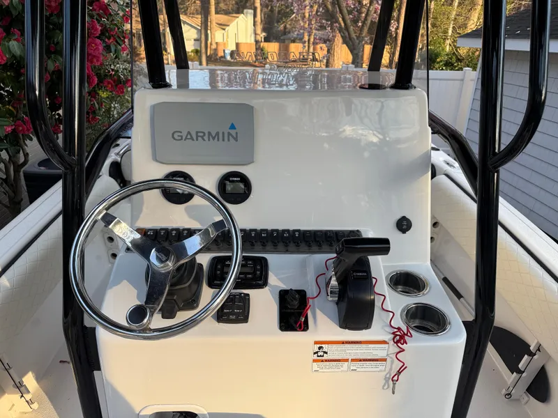 Slide: The Image of 2021 Carolina Skiff 23 Ultra Elite boat console with Garmin navigation system. - 10