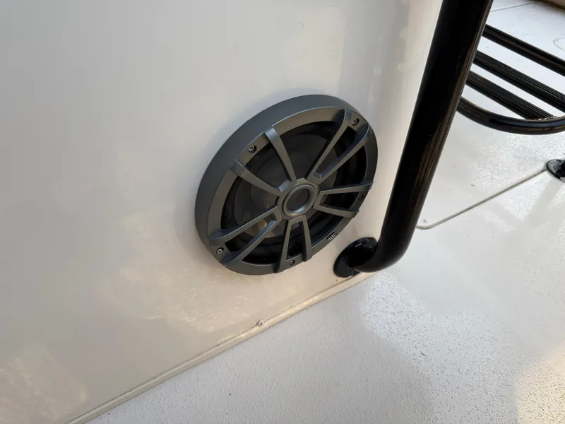 Slide: The Image of Speaker on 2021 Carolina Skiff 23 Ultra Elite boat, mounted on white surface. - 17