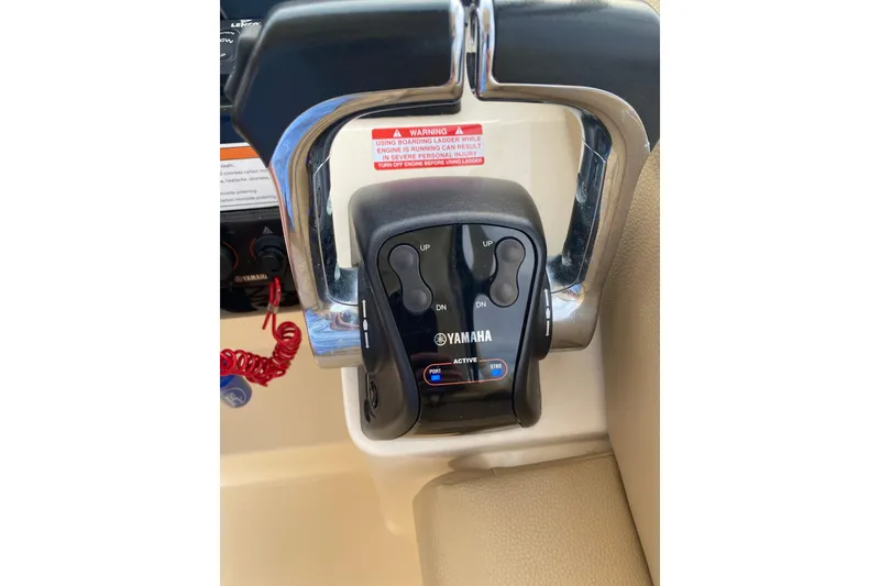 Slide: The Image of Yamaha throttle control on 2019 Scout 255 Dorado boat dashboard. - 13