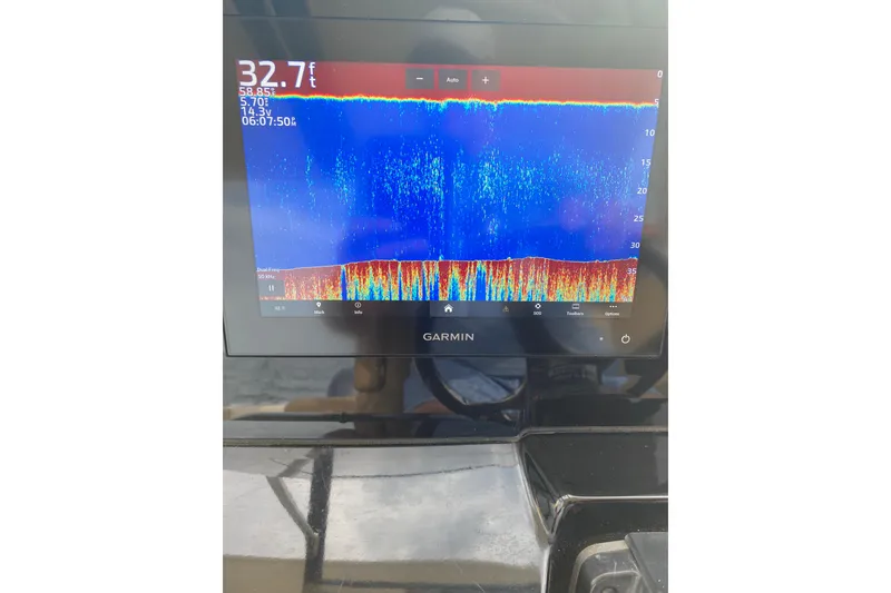 Slide: The Image of Fishfinder display on 2019 Scout 255 Dorado showing depth and sonar data. - 15