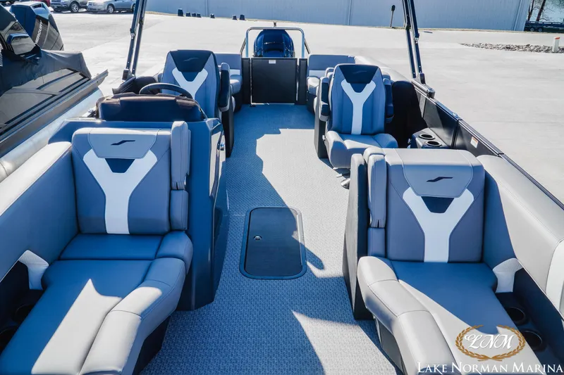 Slide: The Image of Interior of 2026 Evotti 523QL boat with modern seating at Lake Norman Marina. - 12