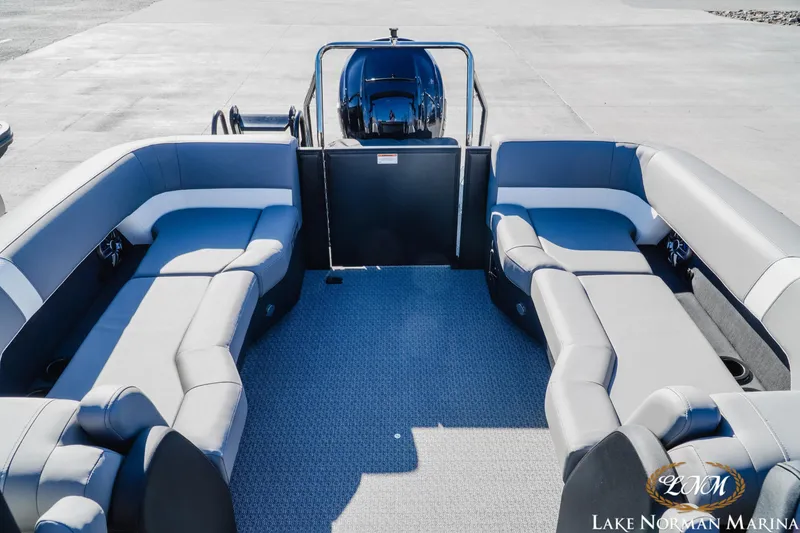 Slide: The Image of Luxurious 2026 Evotti 523QL pontoon boat interior with spacious seating at Lake Norman Marina. - 16