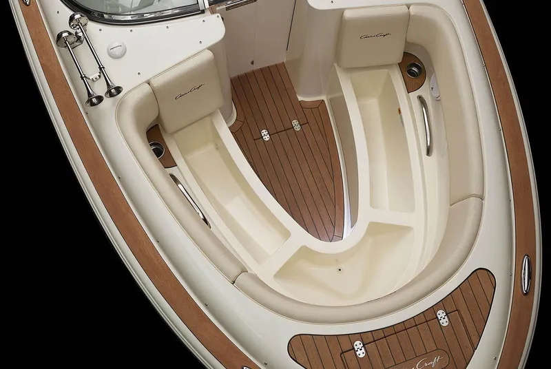 Slide: The Image of Manufacturer Provided Image: 2025 Chris-Craft Launch 27 boat interior with elegant seating and wood finish. - 18
