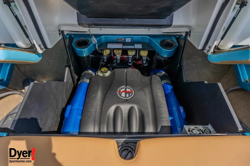 Slide: The Image of 2022 MasterCraft X24 engine compartment with Ilmor engine, showcasing advanced marine technology. - 18