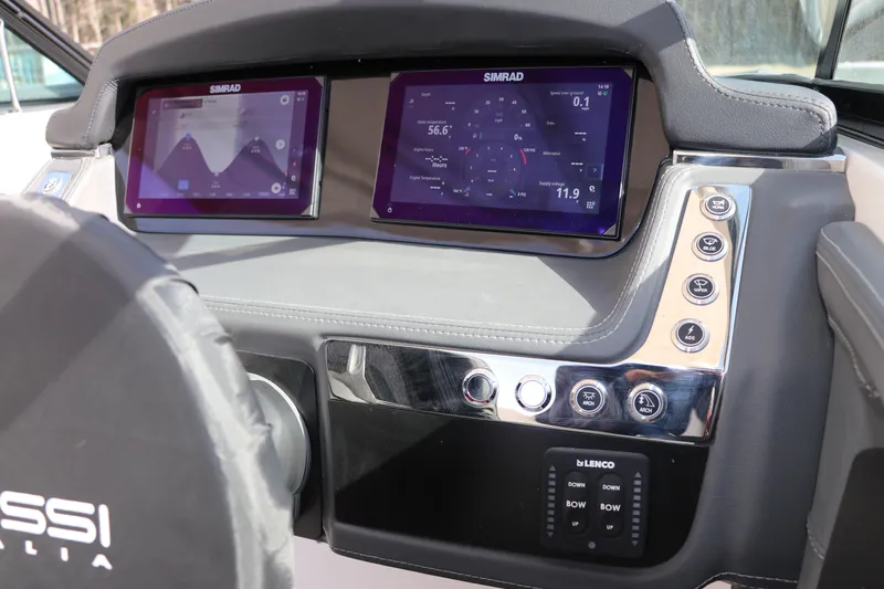 Slide: The Image of Dashboard of 2026 Chaparral 270 OSX boat with dual Simrad displays. - 17