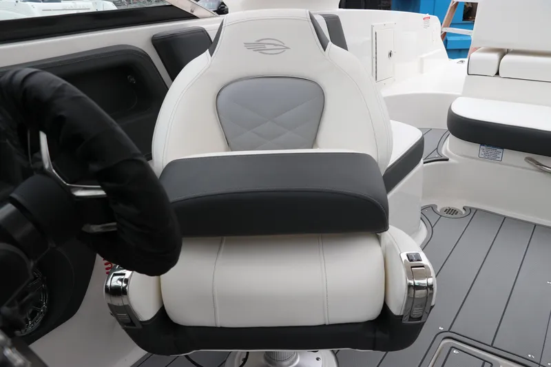 Slide: The Image of Luxury seating in 2026 Chaparral 270 OSX boat cockpit, featuring modern design and comfort. - 22
