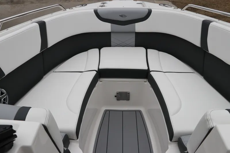 Slide: The Image of 2026 Chaparral 270 OSX boat interior with sleek, modern seating design. - 37