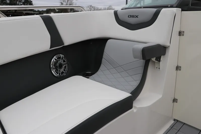 Slide: The Image of 2026 Chaparral 270 OSX boat interior with sleek seating and integrated speaker. - 39