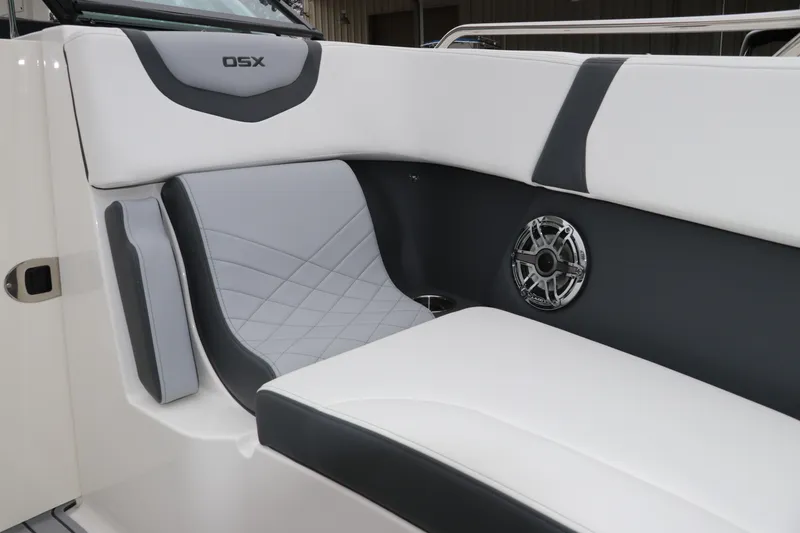 Slide: The Image of 2026 Chaparral 270 OSX boat interior with sleek seating and integrated speaker system. - 41