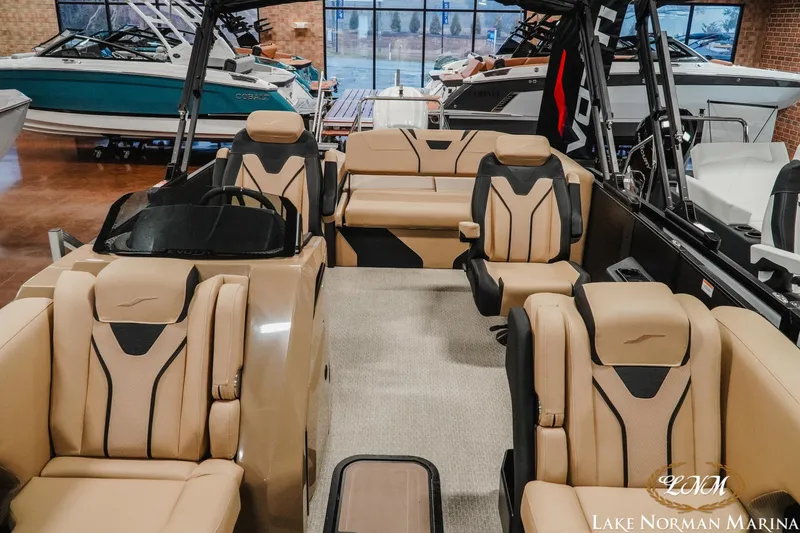 Slide: The Image of Luxury interior of 2026 Evotti 725CS boat at Lake Norman Marina showroom. - 12
