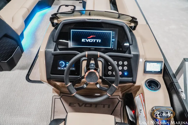 Slide: The Image of Evotti 725CS 2026 boat dashboard with steering wheel and digital display. - 21