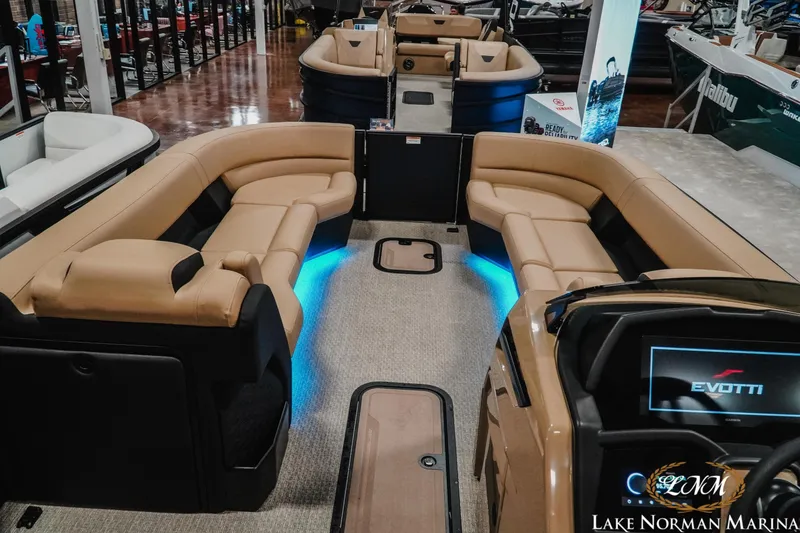 Slide: The Image of Luxurious 2026 Evotti 725CS boat interior with plush seating and ambient lighting at Lake Norman Marina. - 22