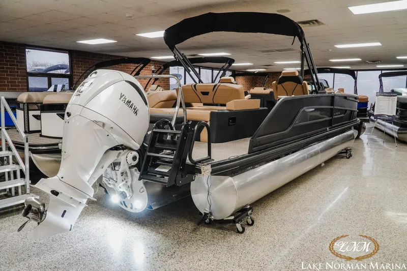 Slide: The Image of 2026 Evotti 725CS pontoon boat with Yamaha outboard engine at Lake Norman Marina. - 3