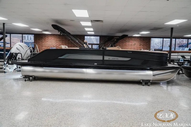 Slide: The Image of 2026 Evotti 725CS pontoon boat displayed indoors at Lake Norman Marina. - 6
