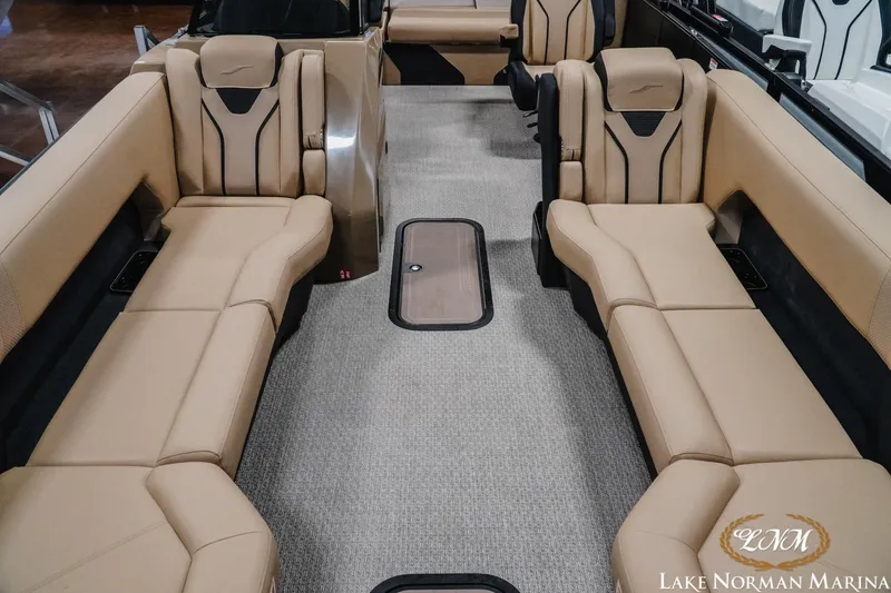 Slide: The Image of Luxurious interior of 2026 Evotti 725CS boat with beige seating at Lake Norman Marina. - 9