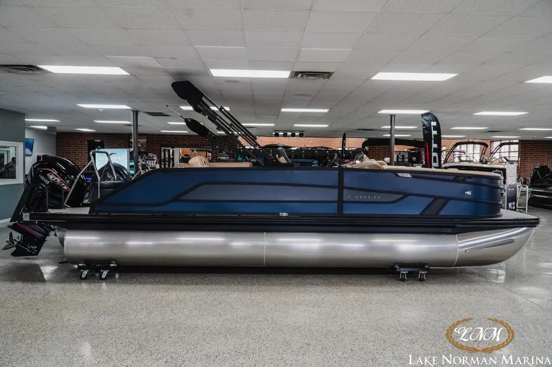 The Image of 2026 Evotti 523CS pontoon boat displayed indoors at Lake Norman Marina. - 1