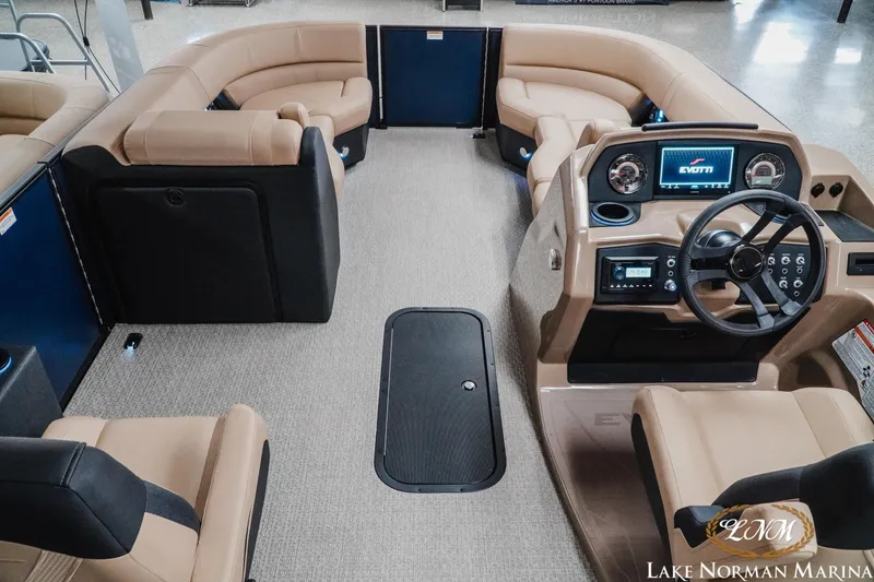 Slide: The Image of Luxurious interior of 2026 Evotti 523CS pontoon boat with modern dashboard and seating. - 10