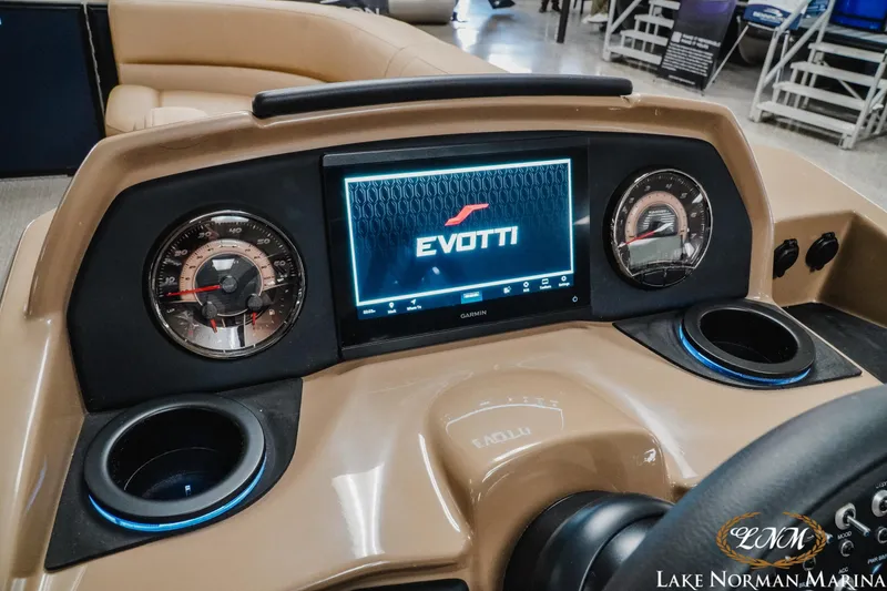 Slide: The Image of Dashboard of 2026 Evotti 523CS boat with digital display and gauges. - 13