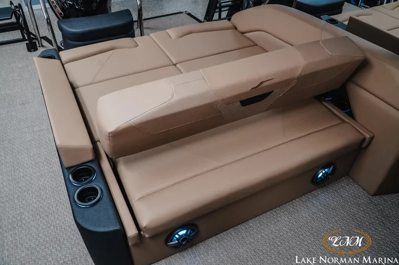 Slide: The Image of Luxurious Evotti 523CS 2026 boat seating with cup holders and premium upholstery at Lake Norman Marina. - 21