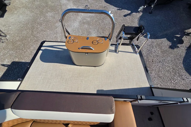 Slide: The Image of 2026 Avalon Platinum Catalina 2585 Elite boat deck with seating and ladder. - 8