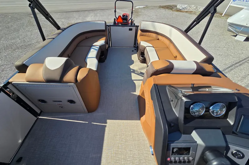 Slide: The Image of 2026 Avalon Platinum Catalina 2585 Elite pontoon boat interior with luxurious seating and modern dashboard. - 9