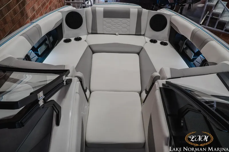 Slide: The Image of 2026 Malibu Wakesetter 22 MXZ interior with luxurious seating and modern design. - 19