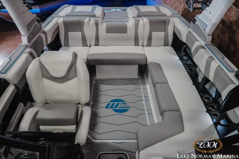 Slide: The Image of 2026 Malibu Wakesetter 22 MXZ interior with luxurious seating and modern design. - 21