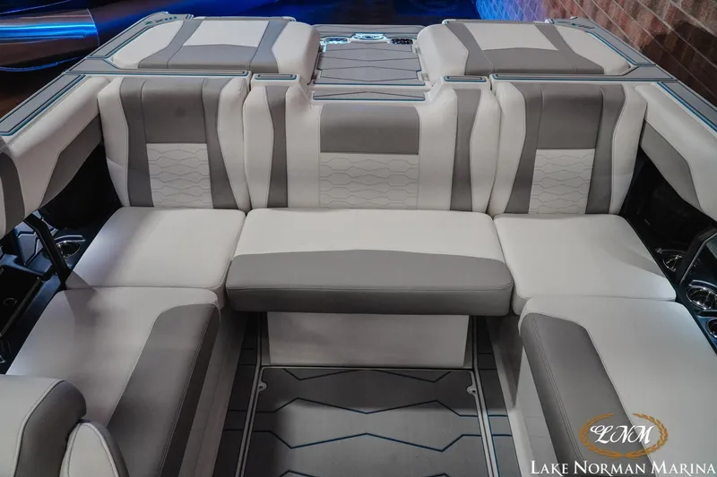 Slide: The Image of 2026 Malibu Wakesetter 22 MXZ interior with luxurious seating and modern design. - 22