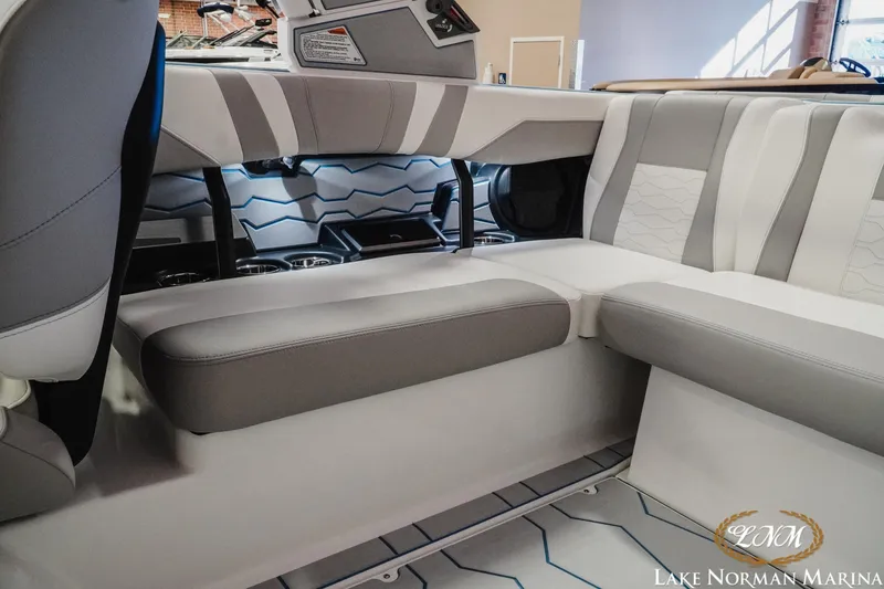 Slide: The Image of 2026 Malibu Wakesetter 22 MXZ interior with stylish seating and modern design. - 23