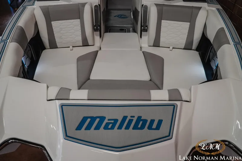 Slide: The Image of 2026 Malibu Wakesetter 22 MXZ interior with stylish seating at Lake Norman Marina. - 5