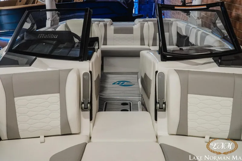 Slide: The Image of 2026 Malibu Wakesetter 22 MXZ interior with modern seating and sleek design. - 6