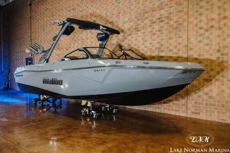 Slide: The Image of 2026 Malibu Wakesetter 23 LSV boat displayed indoors at Lake Norman Marina. - 21
